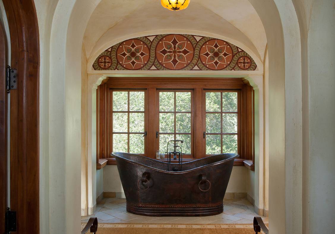 The focal point of the master bath is the pounded copper tub.